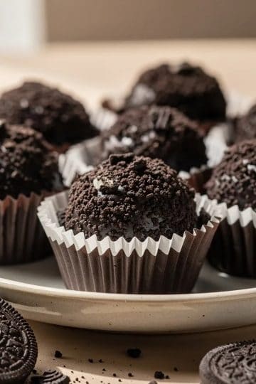 Oreo Brigadeiros close up side view in a plate