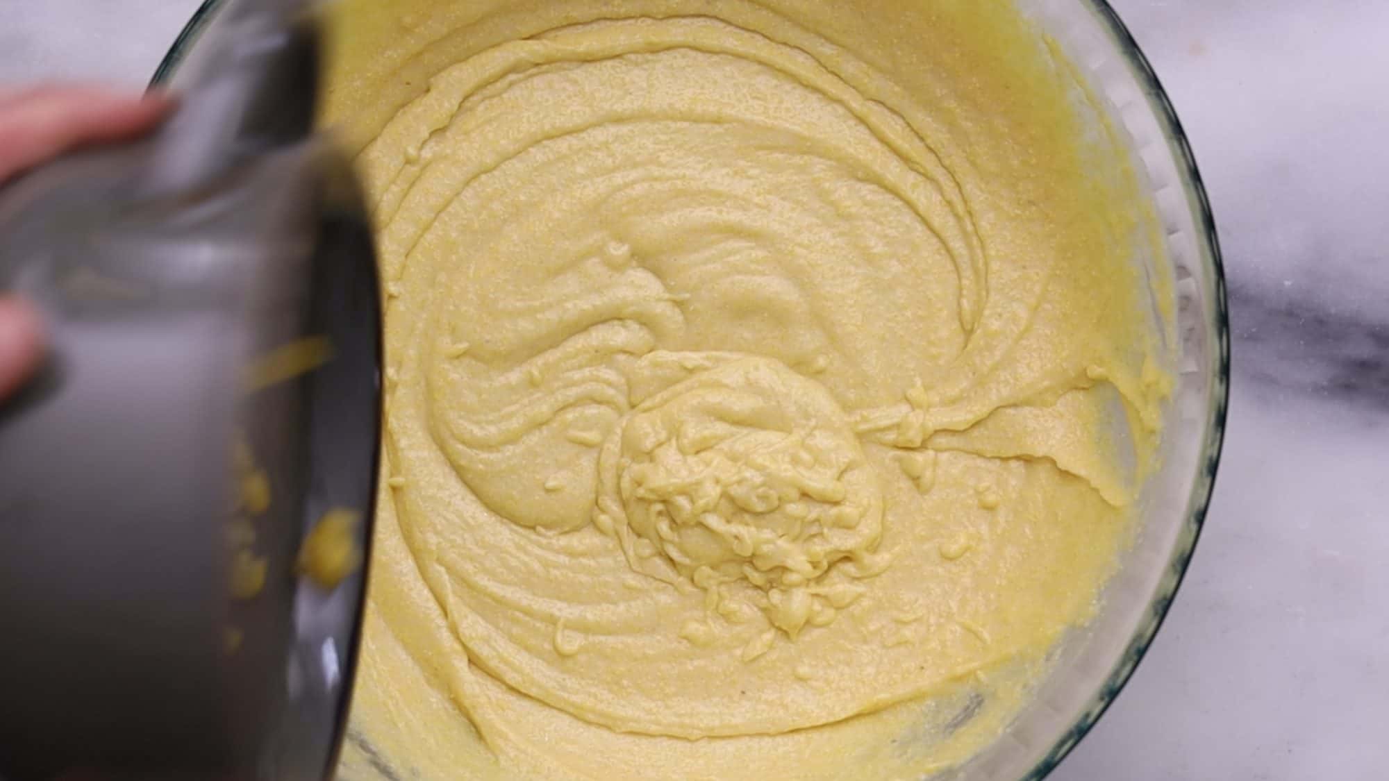 Combine wet and dry ingredients until just combined, then fold in corn. 2/4
