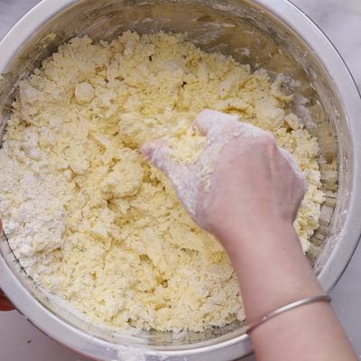 Combine wet and dry ingredients until a coarse crumb forms.