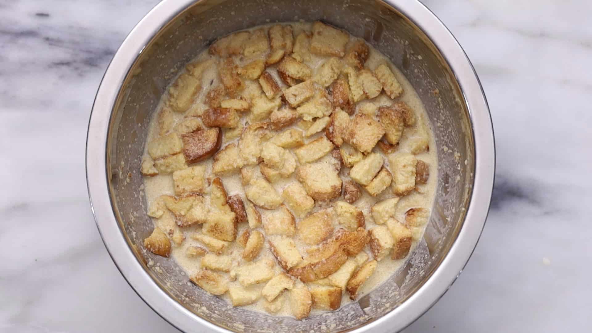 Soak bread in custard