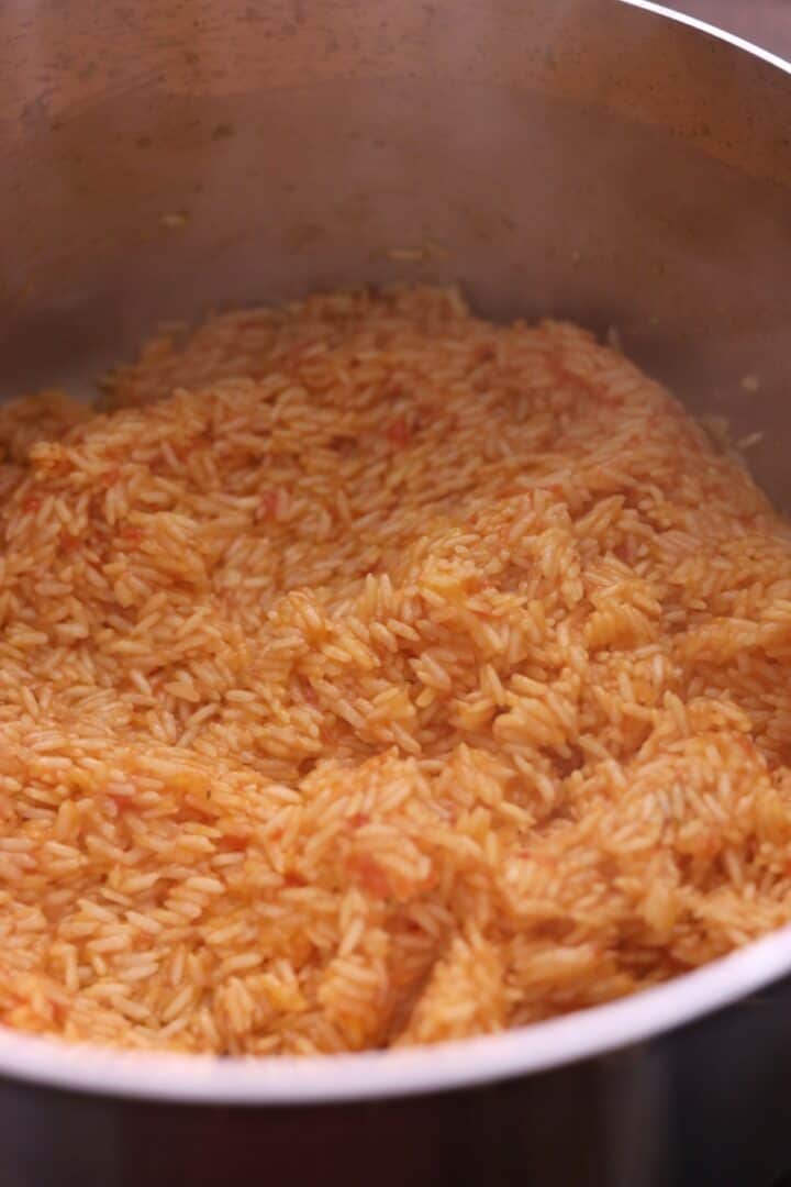 Raw rice in the pot for Arroz Rojo