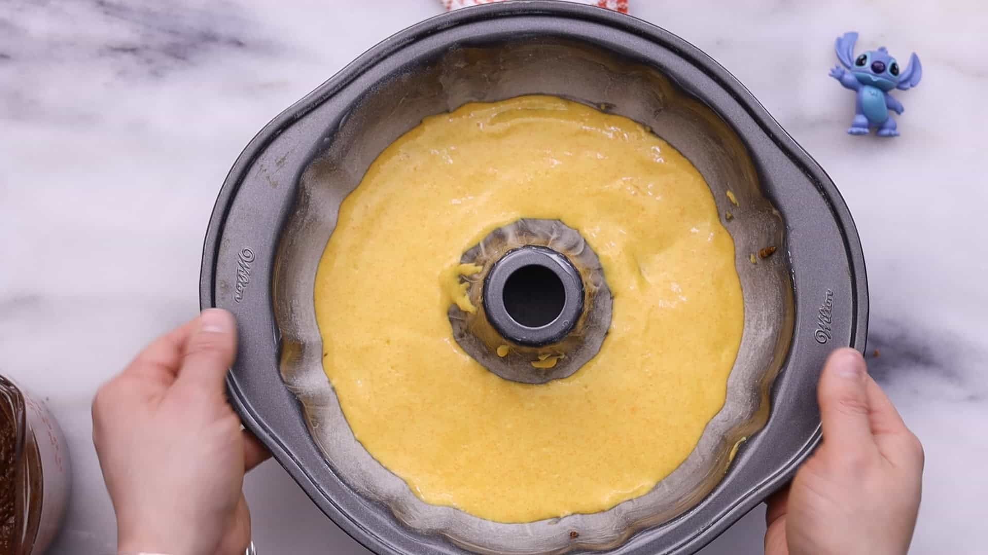 Marble Bundt Carrot Cake 30 Alternate spooning carrot and chocolate batter into pan