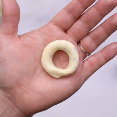 Chipa Piru Dough in a donut shape in hand
