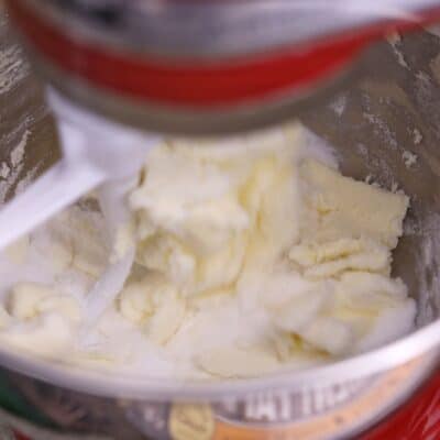 Mixing butter with sugar