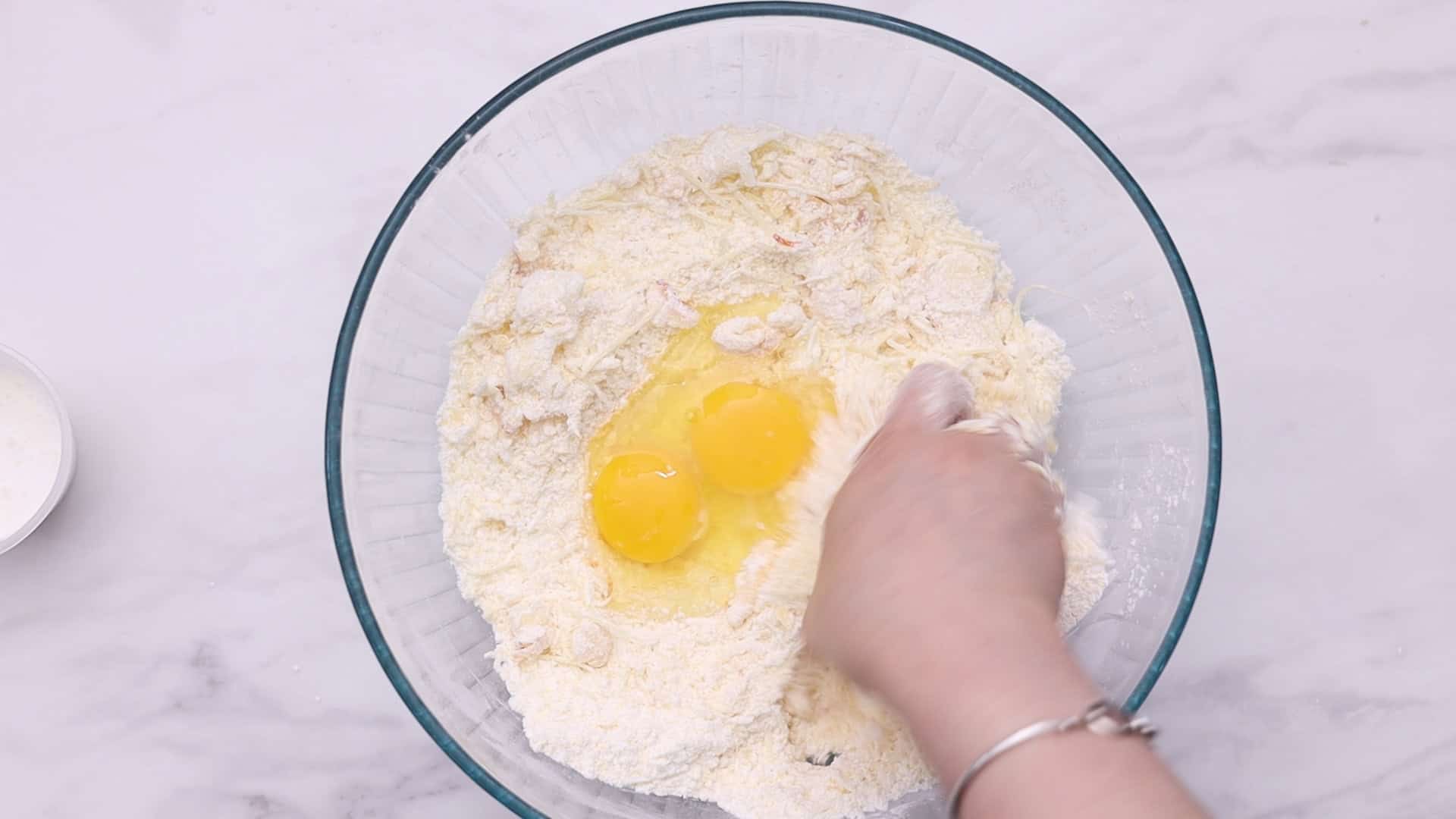 Chipa con Guayaba 15 Add softened butter and eggs