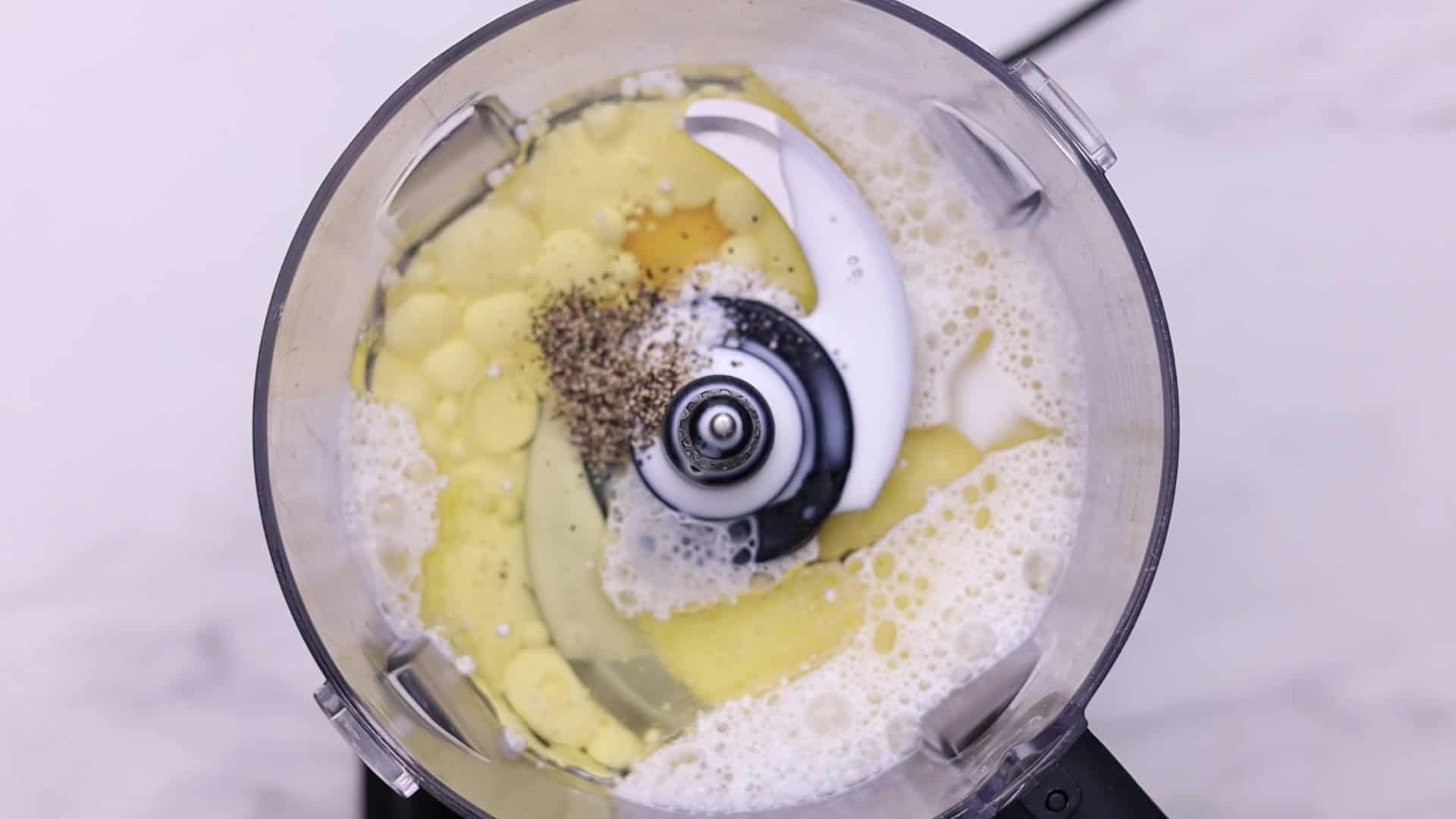 Blend eggs, milk, oil, pepper, and salt