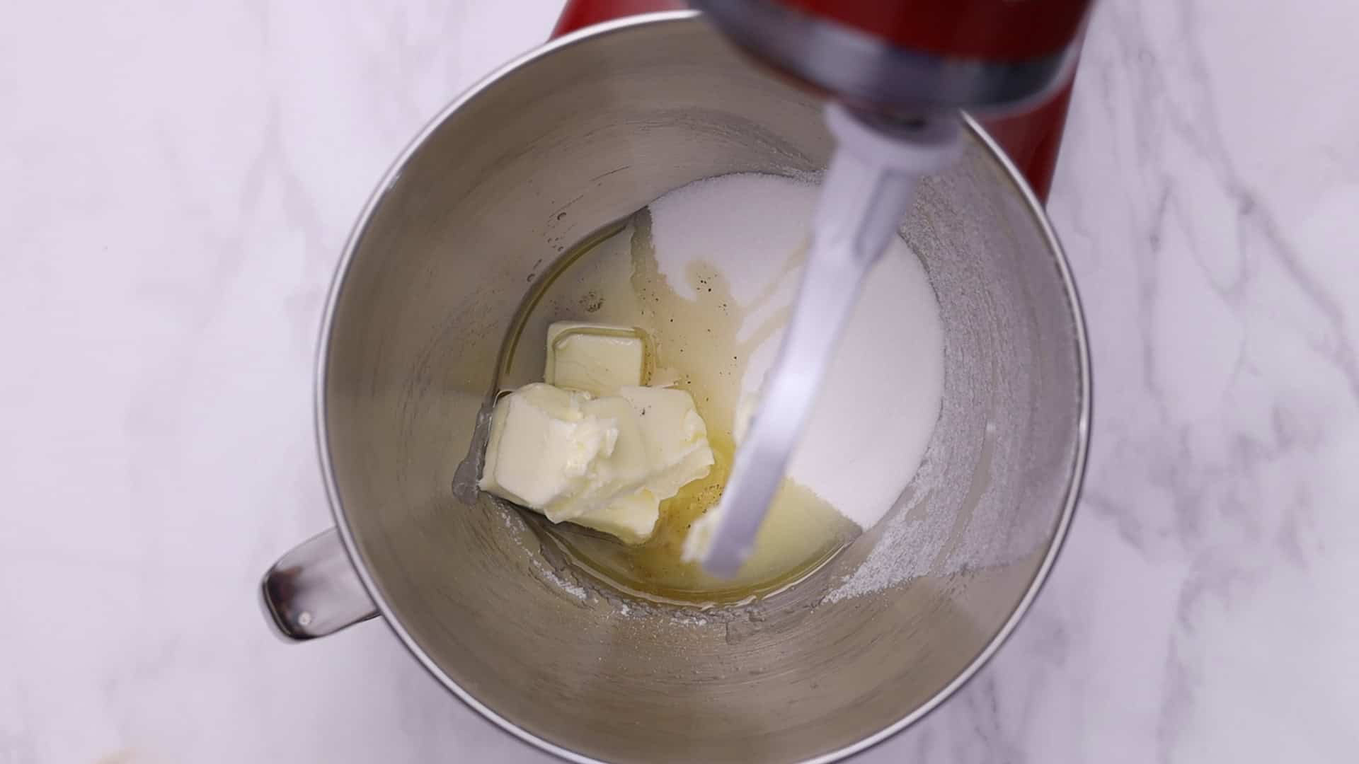 Cream butter, oil, sugar, and eggs.