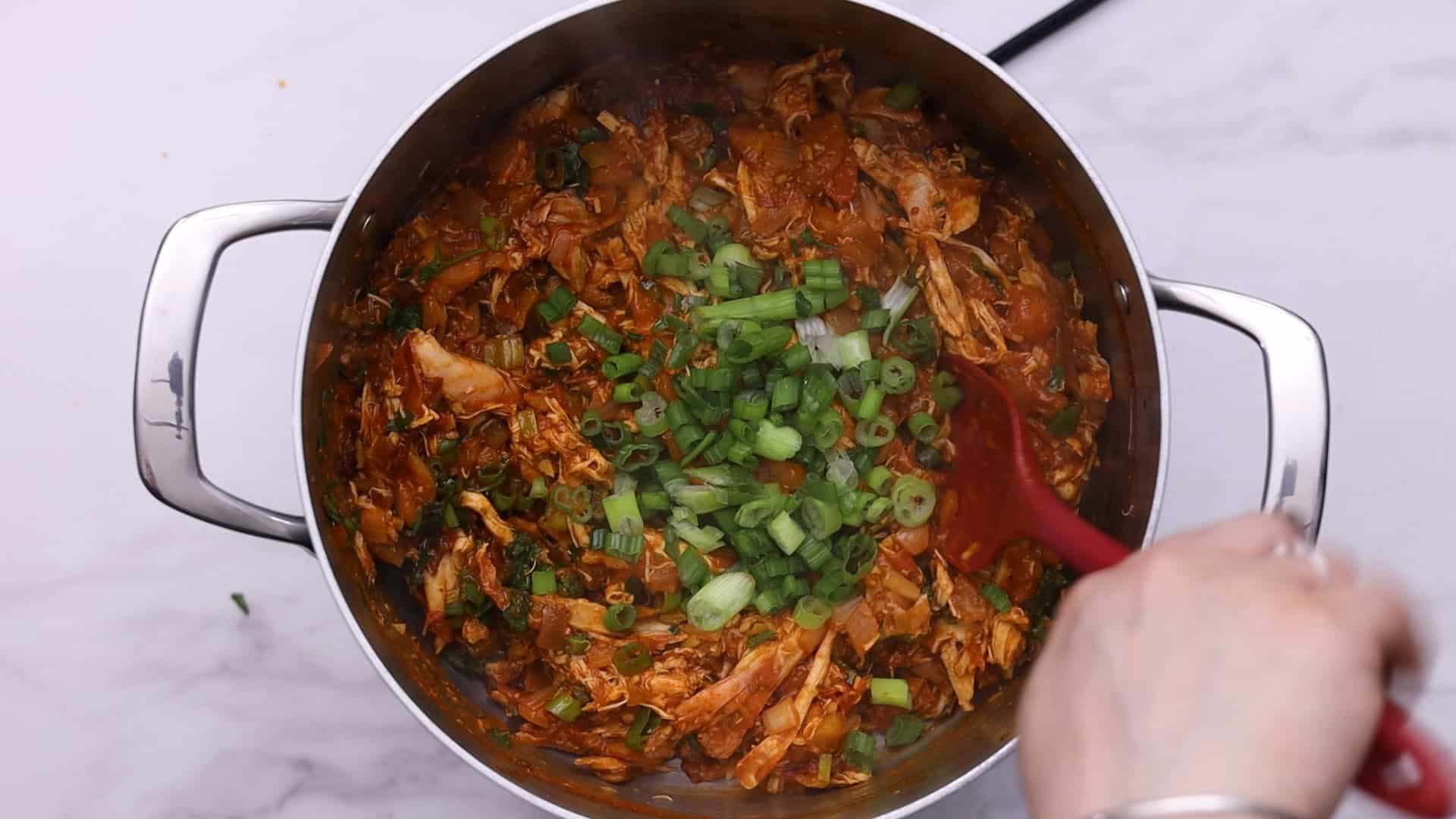 Stir in the green scallions, cilantro