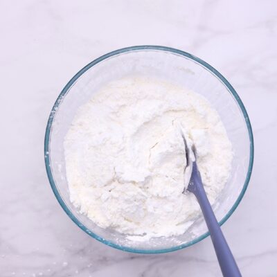 Mix tapioca starch, Parmesan, and cream cheese in a bowl