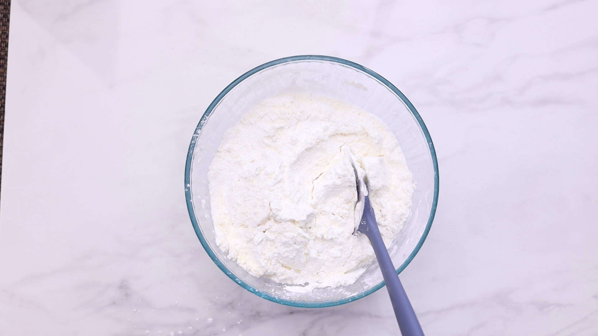 Chipa sin Huevos 11 Mix tapioca starch, Parmesan, and cream cheese in a bowl