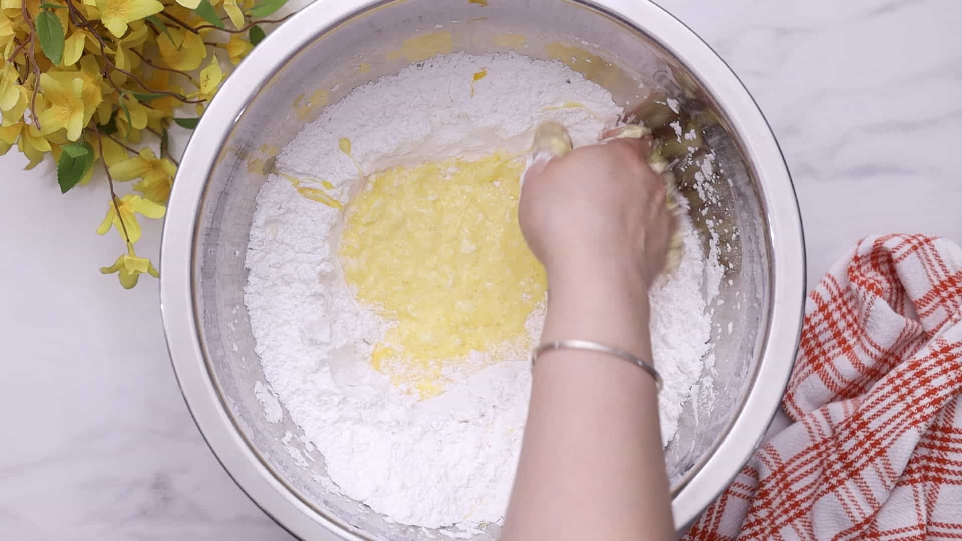 Add butter and eggs; cream until smooth.