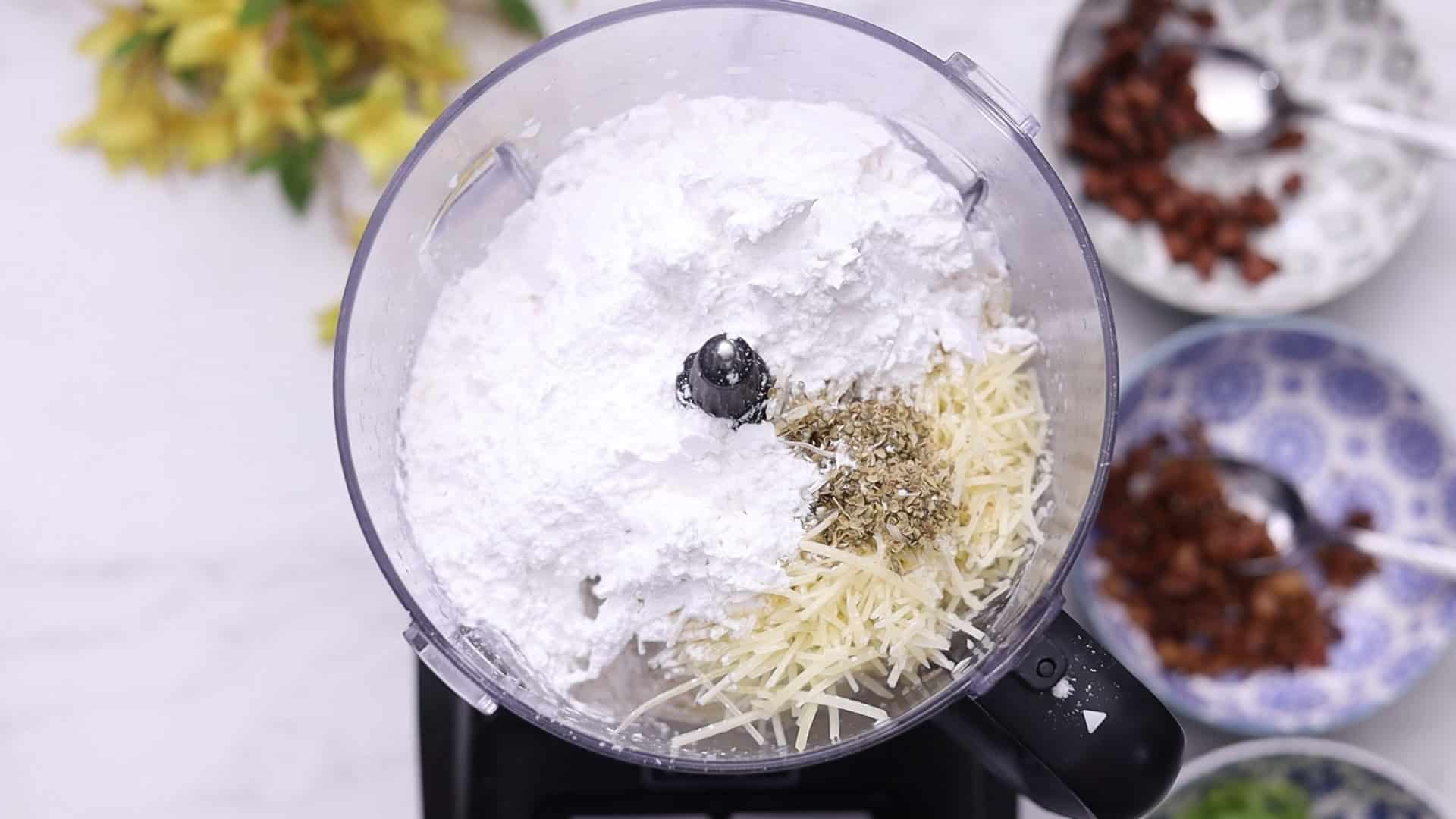 Add tapioca starch, then Parmesan and oregano; blend until thick