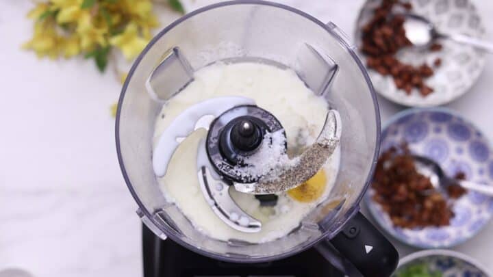 Blend egg, oil, salt, pepper, and