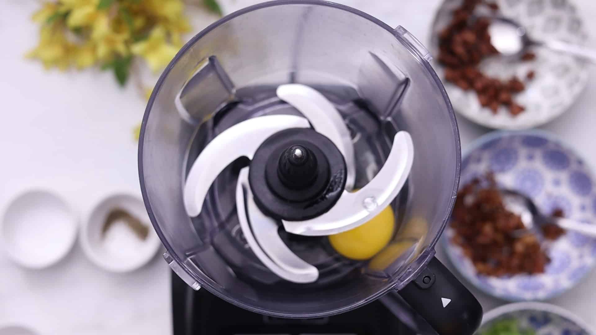 a blender with ingredients in it