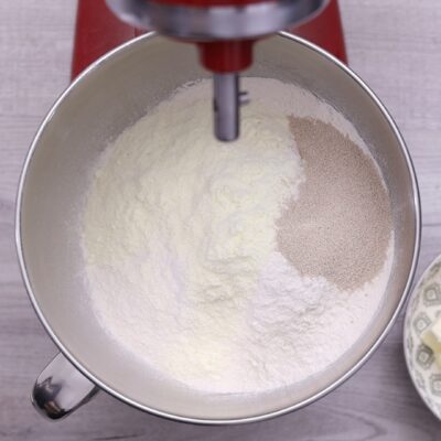 Combine dry ingredients in a stand mixer Flour dry milk and yeast