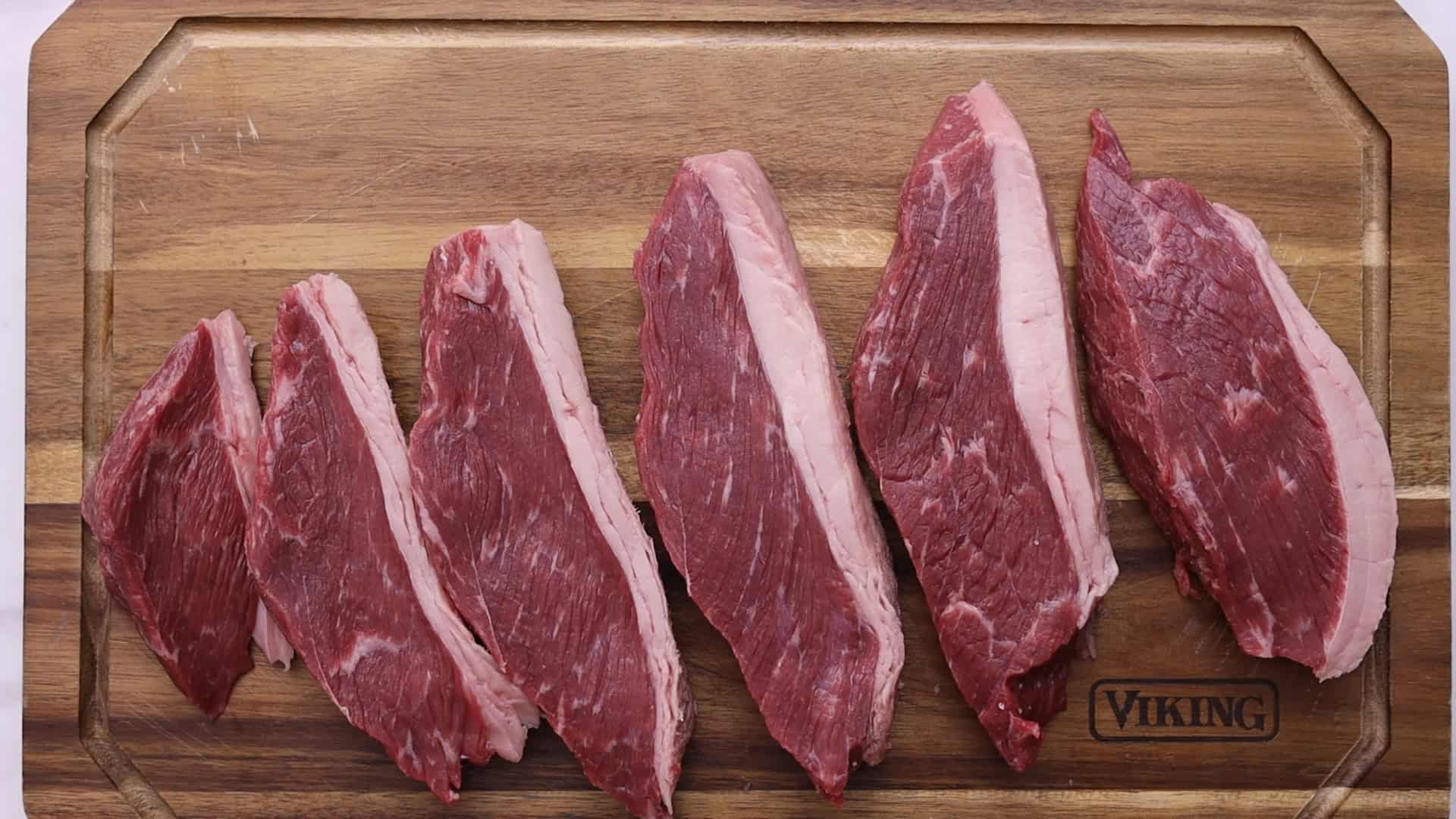 Cut into 1-inch slices or score the fat cap without cutting the meat. 2