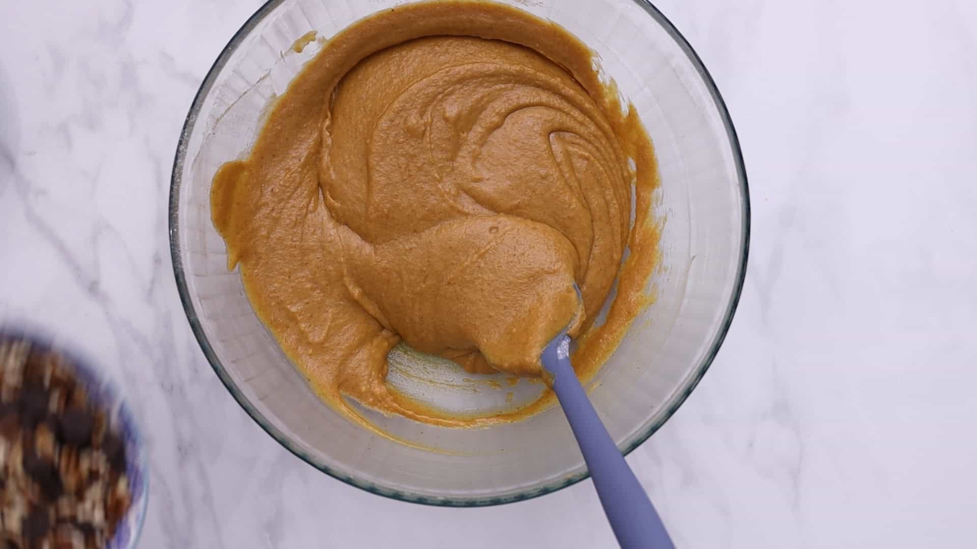 Fold dry ingredients into wet ingredients. Add chocolate chips and pecans.