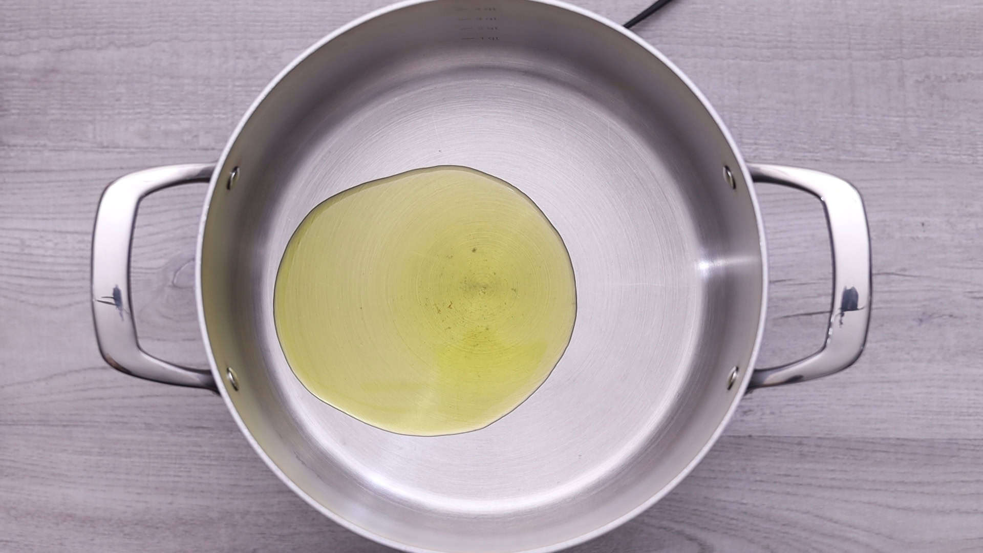 Heat olive oil in a large pot over medium heat