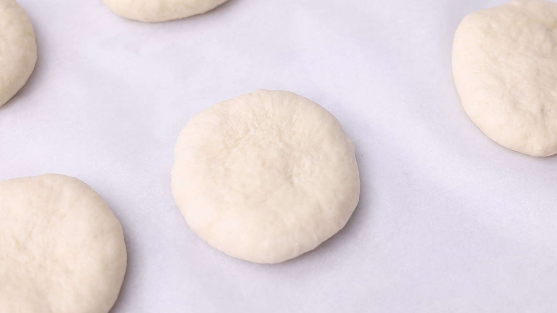 Homemade Burger Buns (Pan de Hamburguesa) 24 Shape into balls, flatten, place on a parchment-lined baking sheet