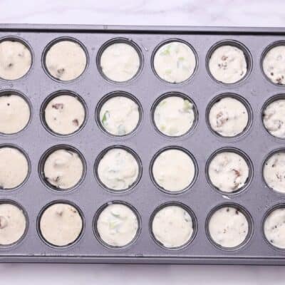 Spray a 24-cup mini muffin pan with oil and fill it with batters