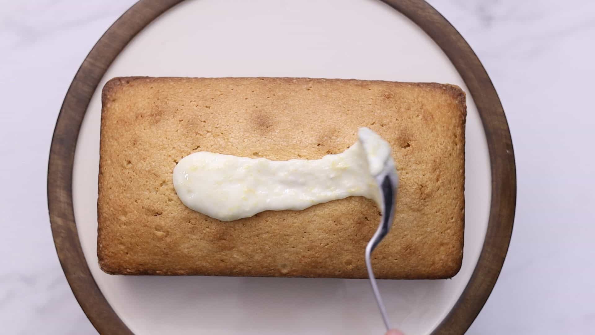Spoon over the cooled cake and let set for 10-15 minutes before serving.