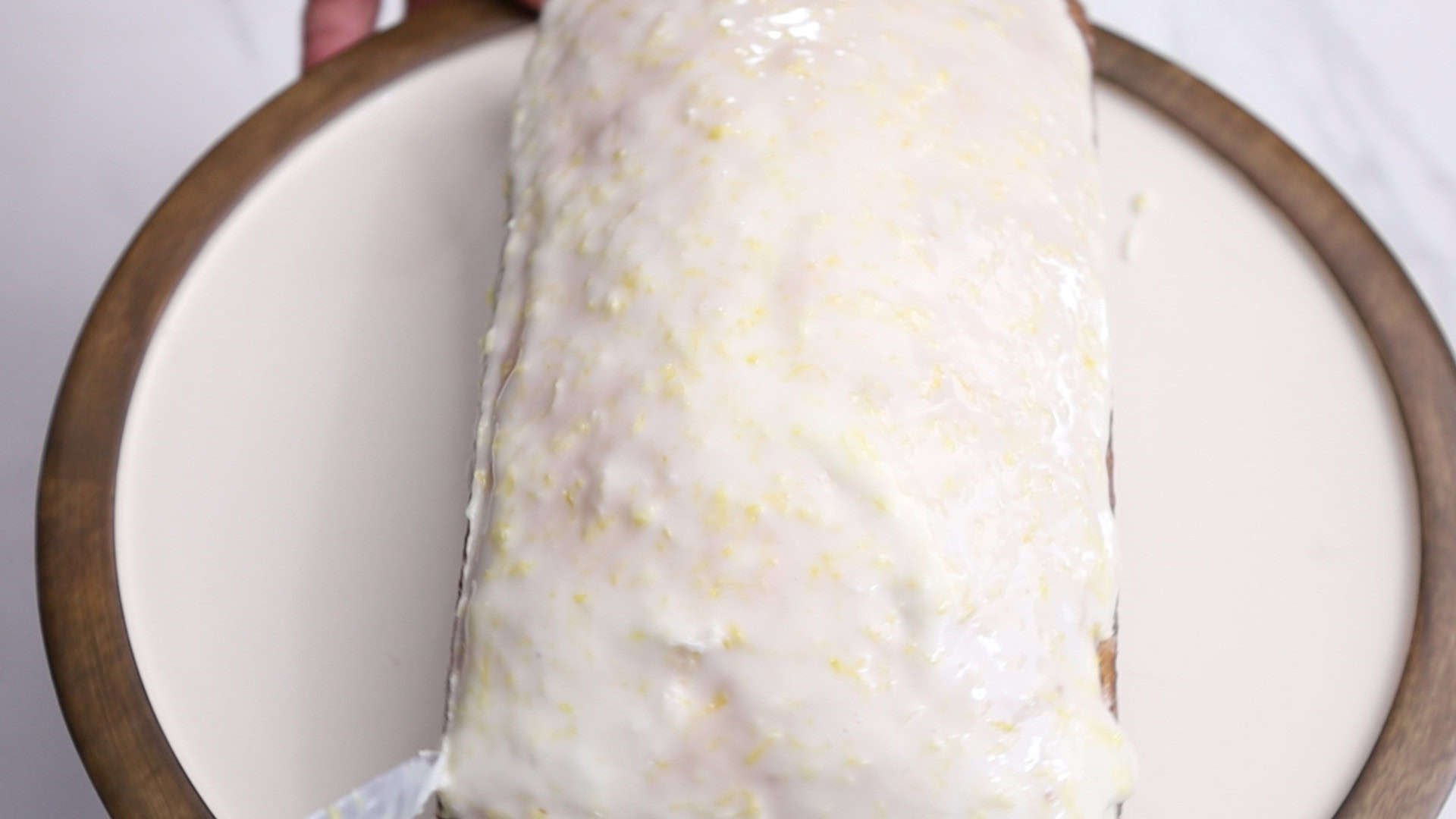 Spoon over the cooled cake and let set for 10-15 minutes before serving.