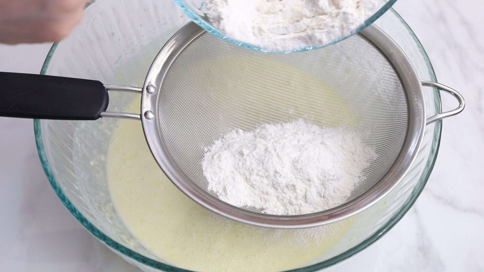 On low speed, alternate adding flour and milk mixture in 3 parts, starting and ending with flour. Mix until combined. 2/4