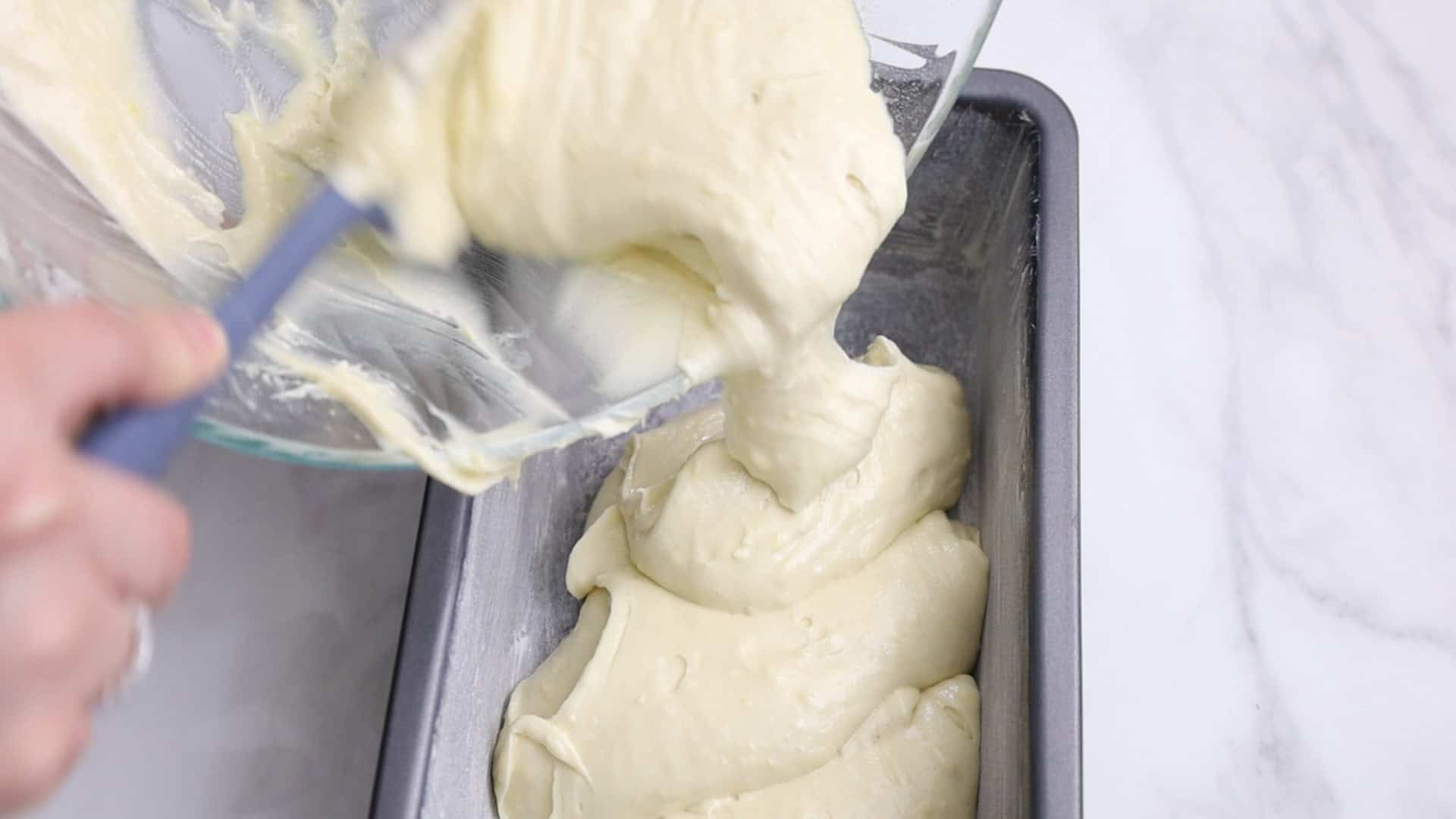 Pour batter into the prepared pan and smooth the top.