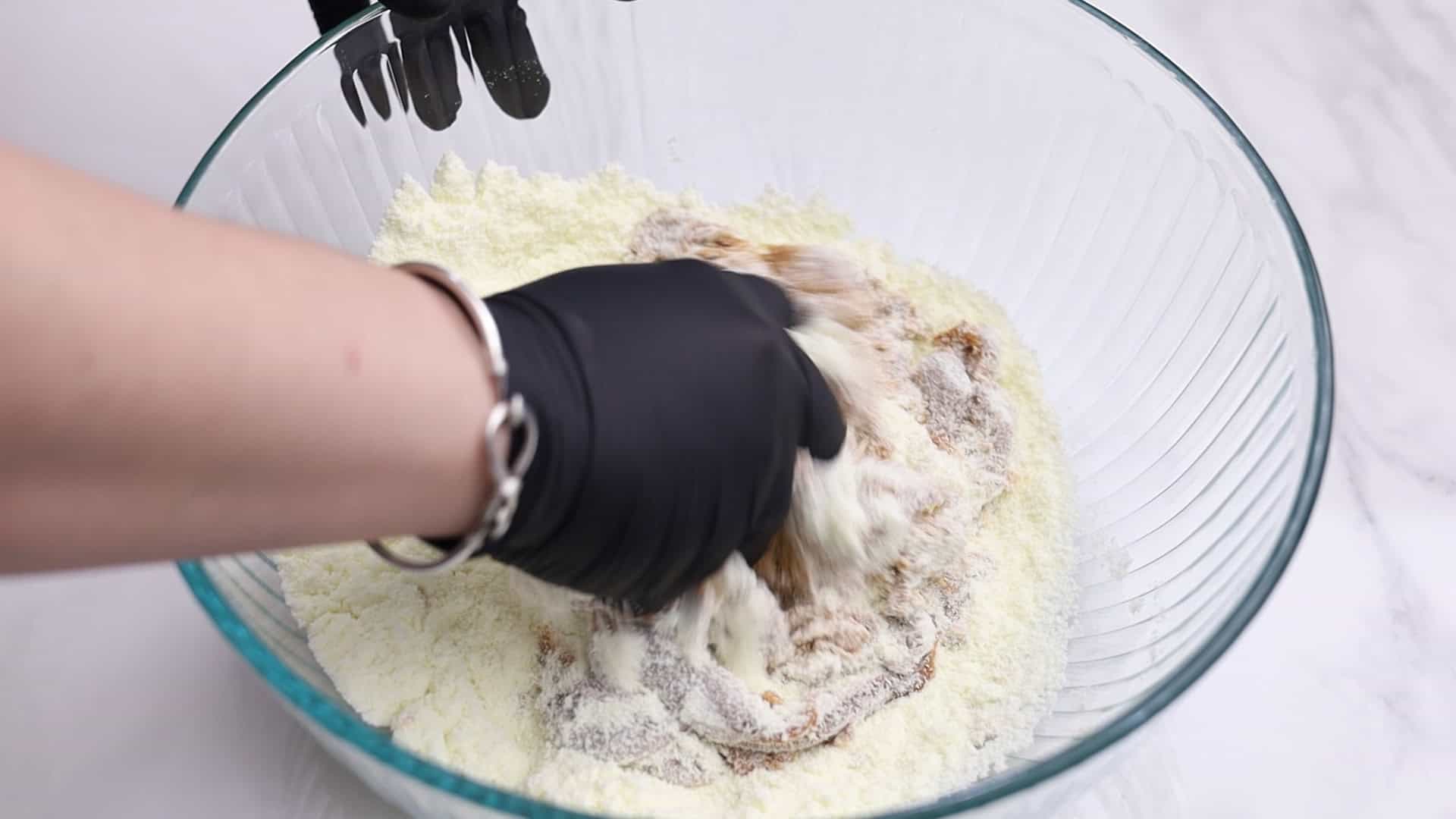 Combine dry milk and dulce de leche in a large mixing bowl.