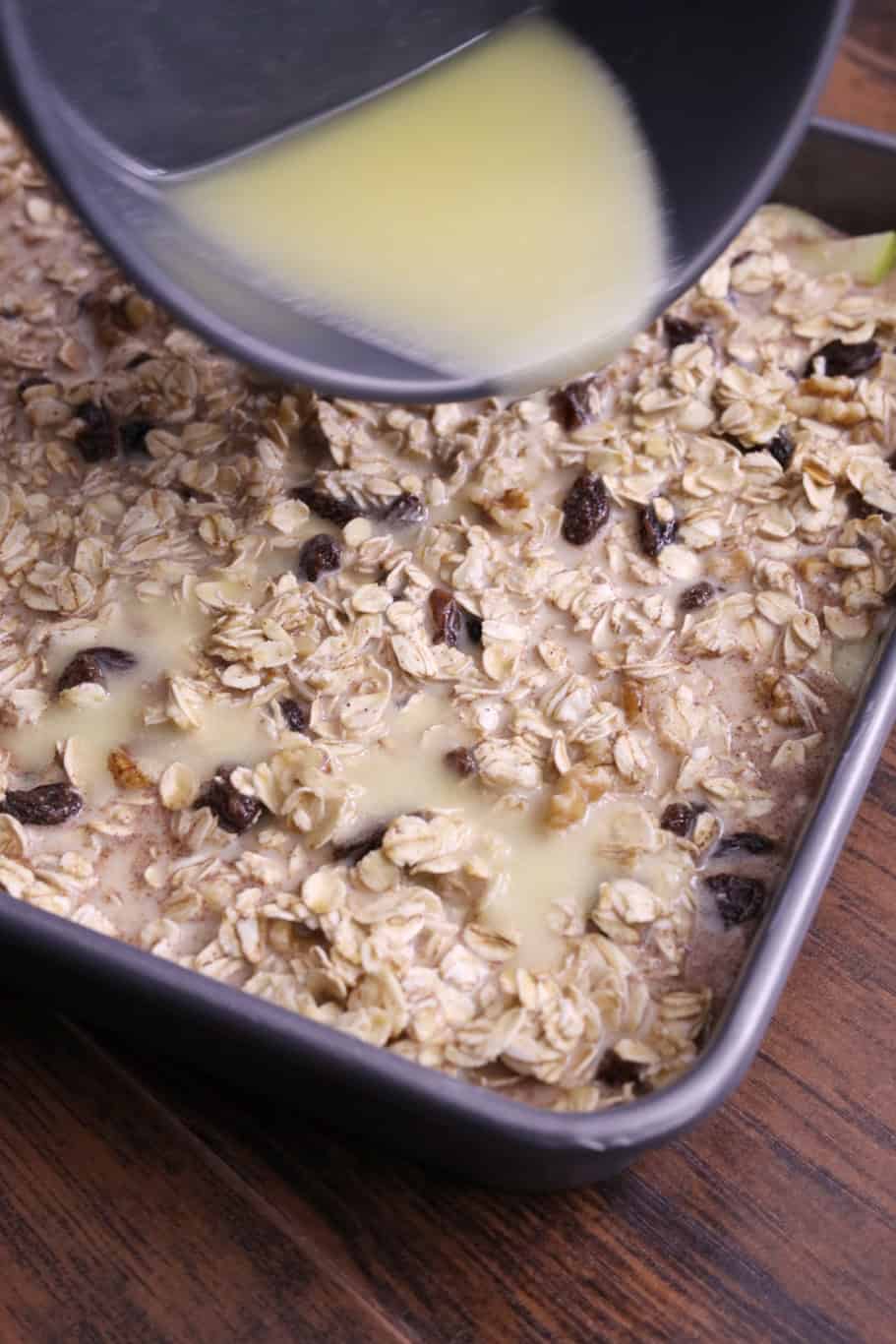 Pouring Butter in Apple baked