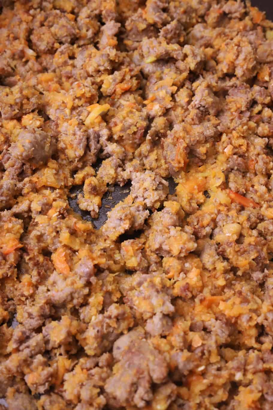 Sausage Lasagna 13 cooking ground sausage and vegetables