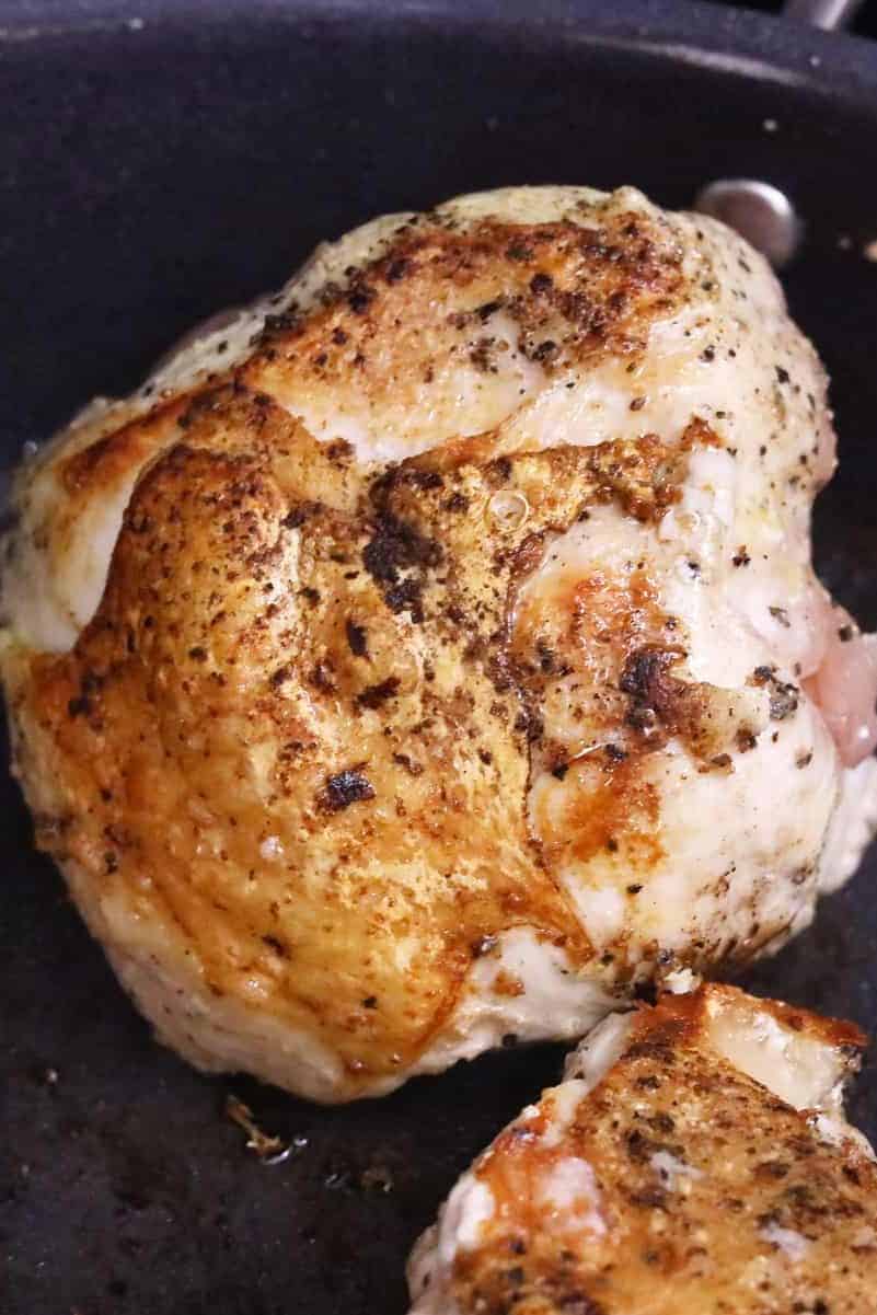 Raw Chicken on the skillet