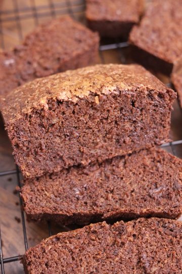 Chocolate banana bread on a cooling rack.