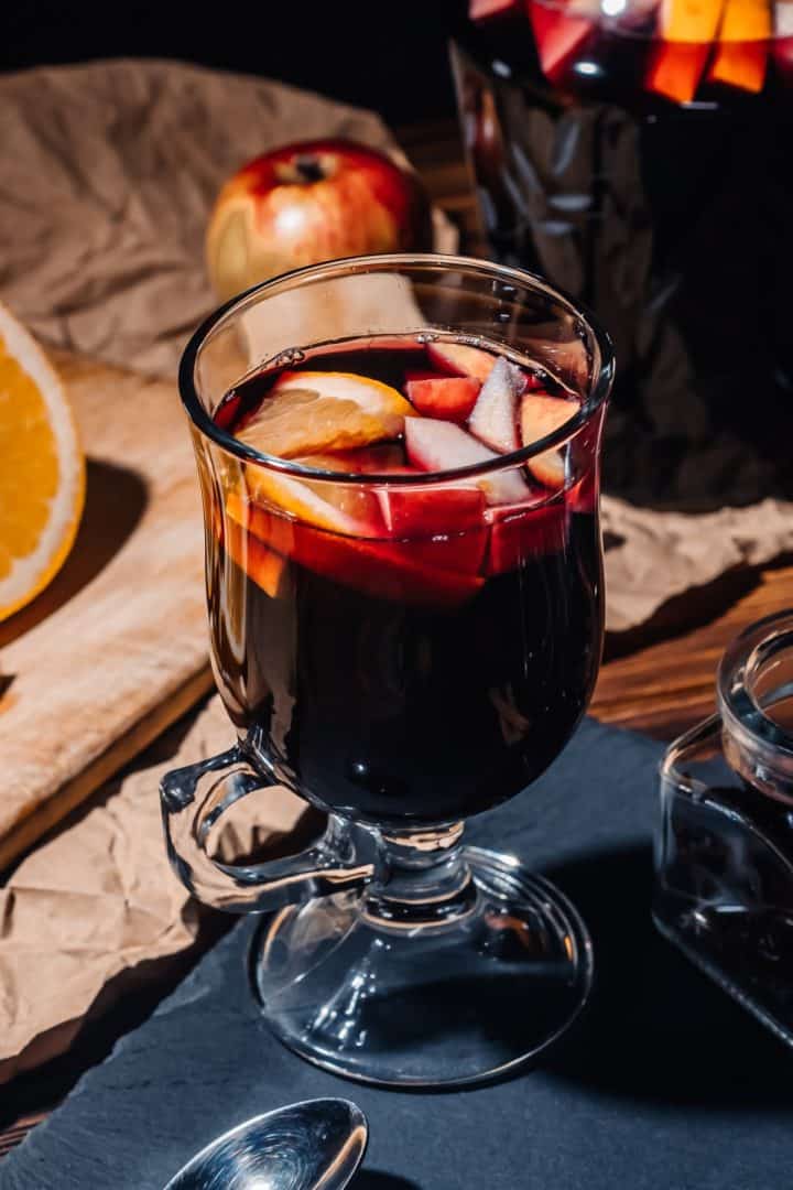 Quentão in a glass and jar side view