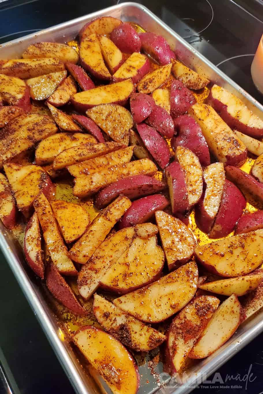 Potatoes in sheetpan ready to cook