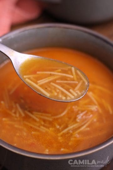 Sopa de Fideo in a spoon