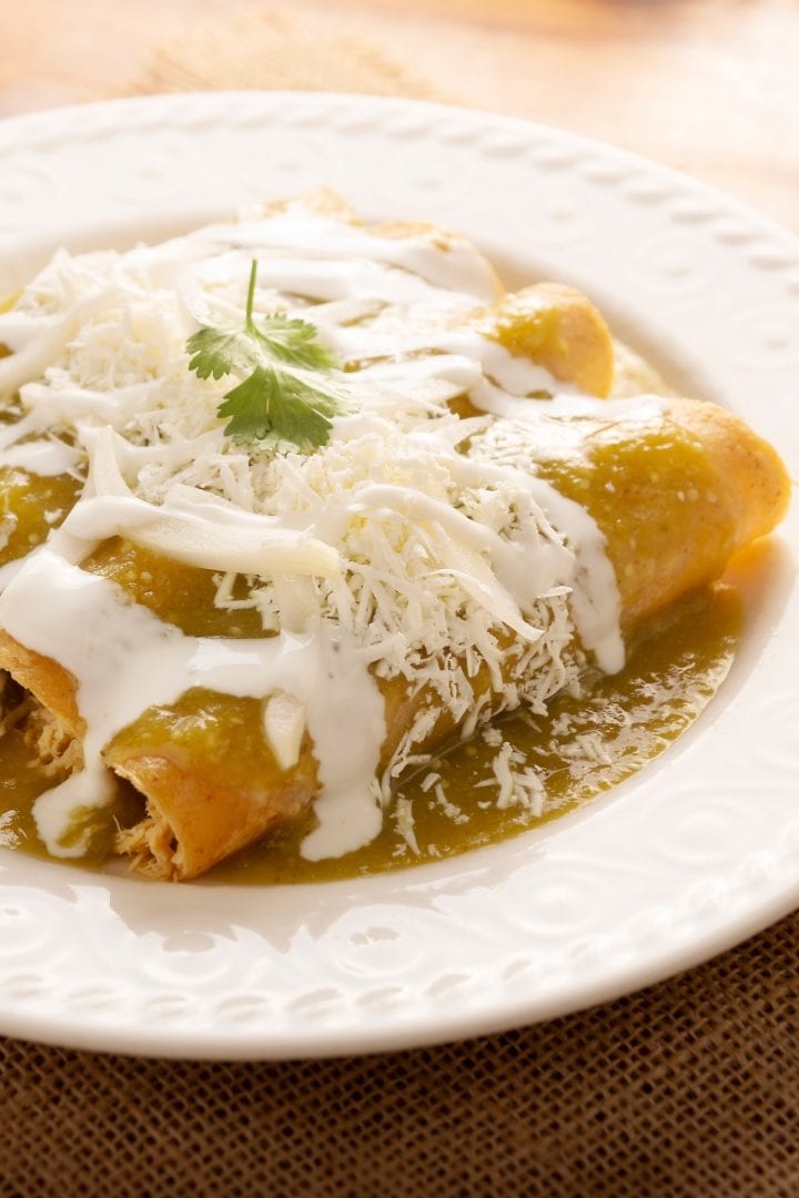 Turkey Enchiladas in a white plate