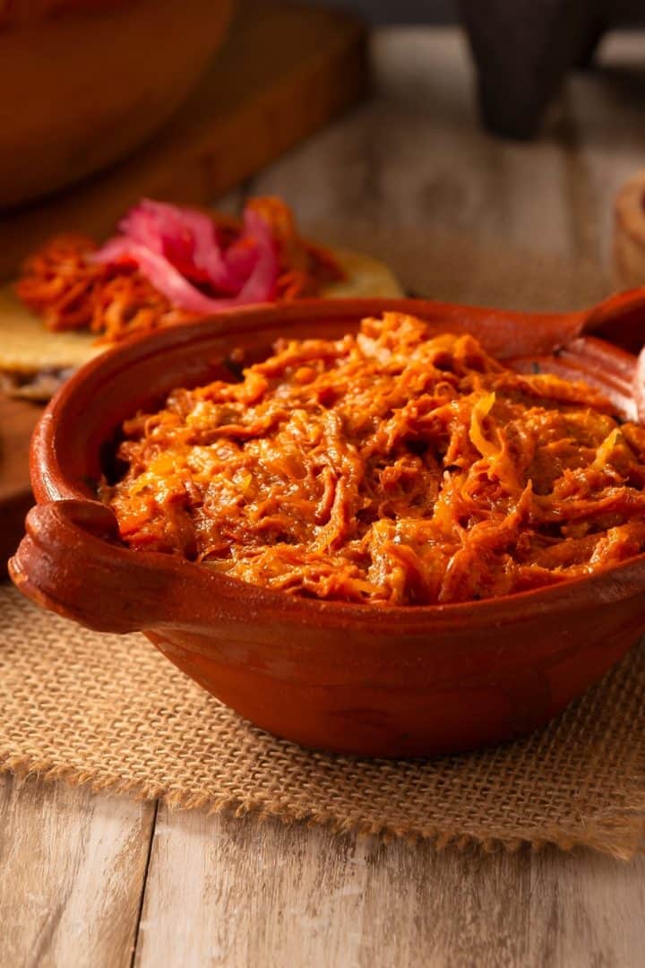 Cochinita Pibil 13 Cochinita Pibil in a clay bowl side view