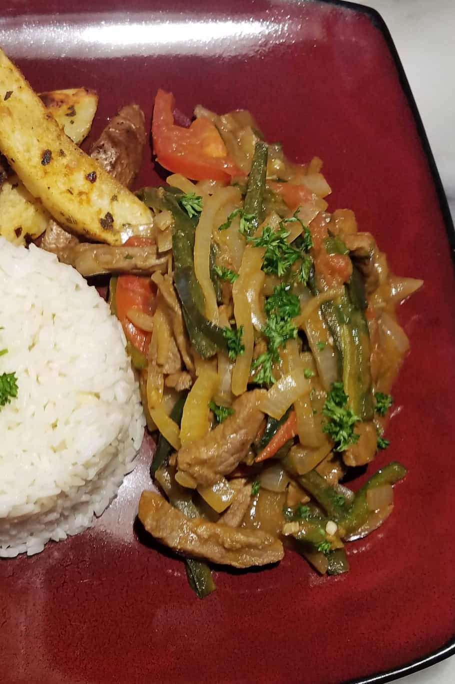 Lomo Saltado with white rice