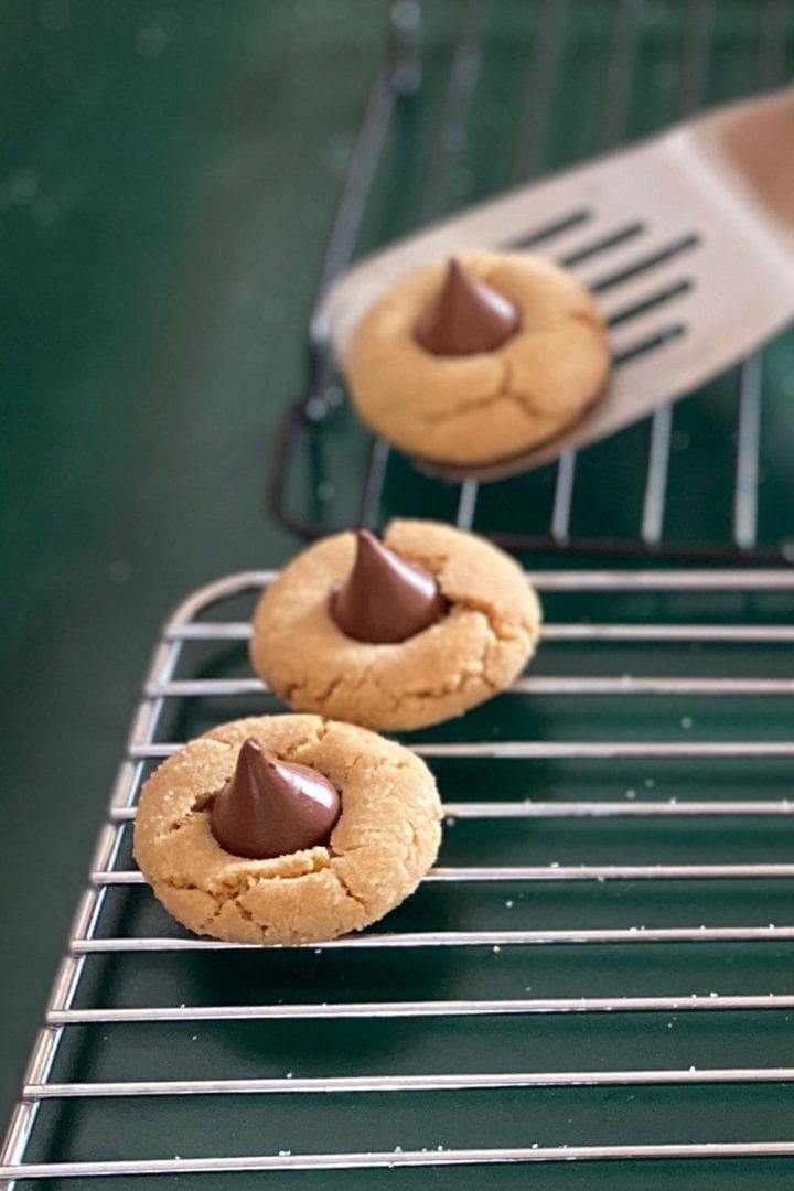 Peanut Butter Cookies with Chocolate Kisses in a rack