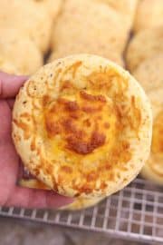 CHIPA 4 quesos close up in a hand