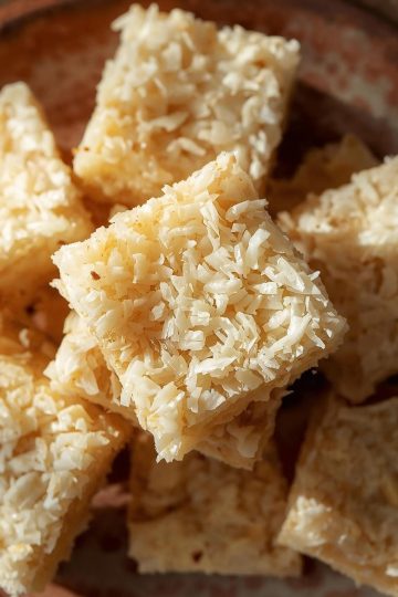 Cocada coconut squares stacked