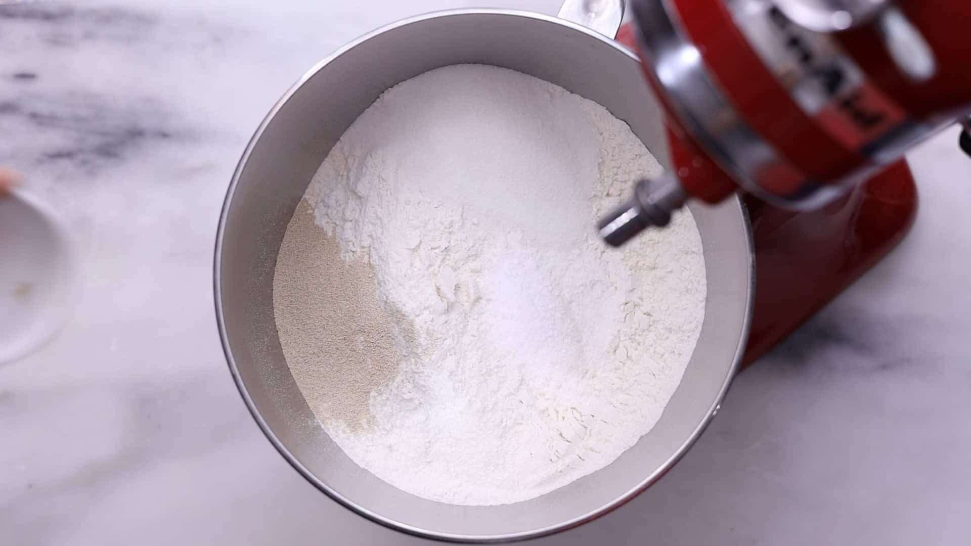 combine flour, salt, sugar, anise seeds, and instant dry yeast. 2/4