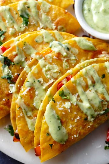 Tacos Envenenados top view close up with avocado crema
