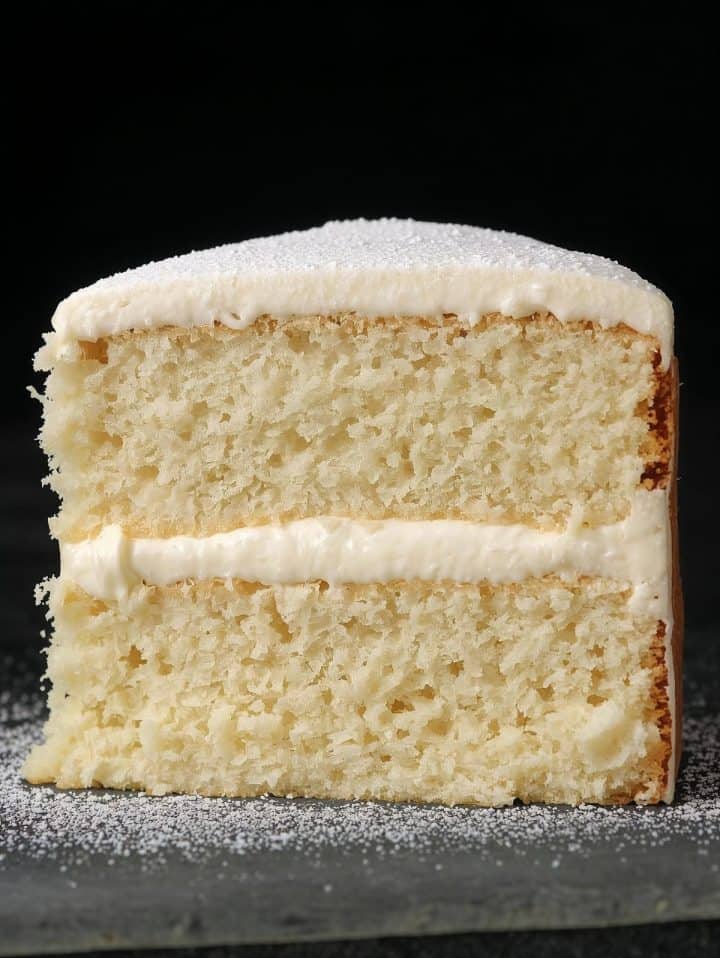 slice of 2 layers vanilla cake close up